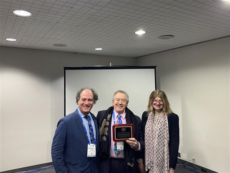 H. Steven Moffic, MD, with the Abraham L. Halpern Humanitarian Award, presented by John H. Halpern, MD; and Aida S. Mihajlovic, MD.