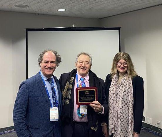 H. Steven Moffic, MD, with the Abraham L. Halpern Humanitarian Award, presented by John H. Halpern, MD; and Aida S. Mihajlovic, MD.