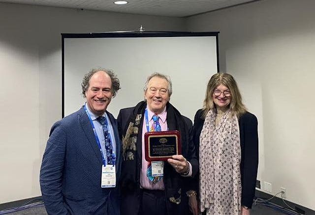 H. Steven Moffic, MD, with the Abraham L. Halpern Humanitarian Award, presented by John H. Halpern, MD; and Aida S. Mihajlovic, MD.